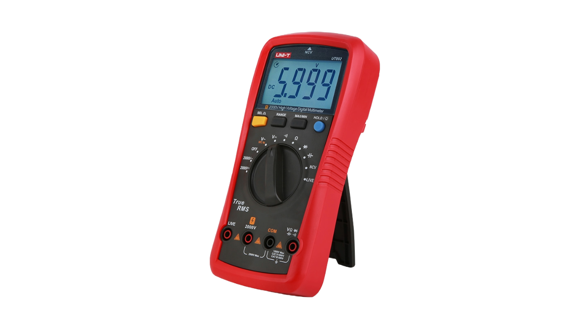 Red digital multimeter on a white background